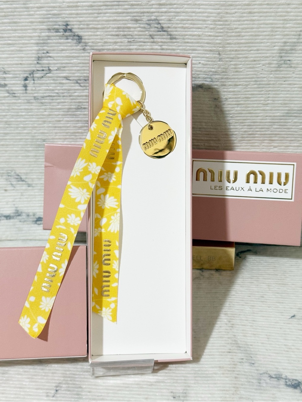 Miu Miu Beauty Yellow with Daisy Flower Design Ribbon Keychain with Gold Charm - Picture 2 of 7